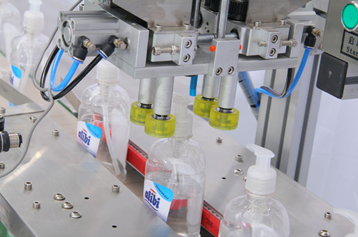 screw capping machine تجهیزات درپوش پیچی.jpg