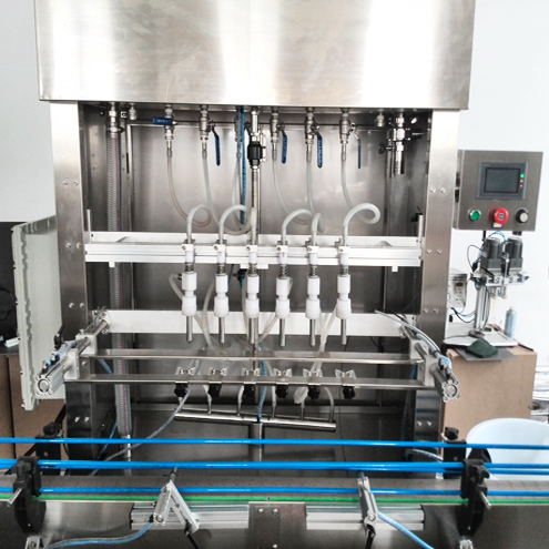 6 heads overflow filling machine ماشین آلات پرکن سرریز.jpg