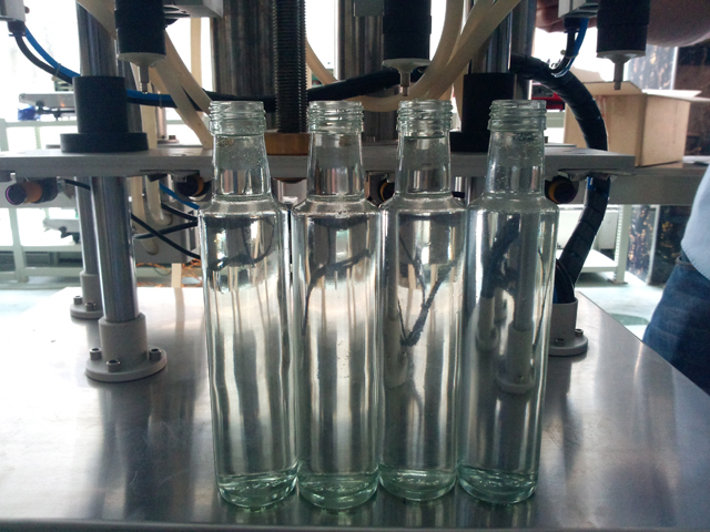 perfume bottles for overflow filling پرکننده عطر.jpg