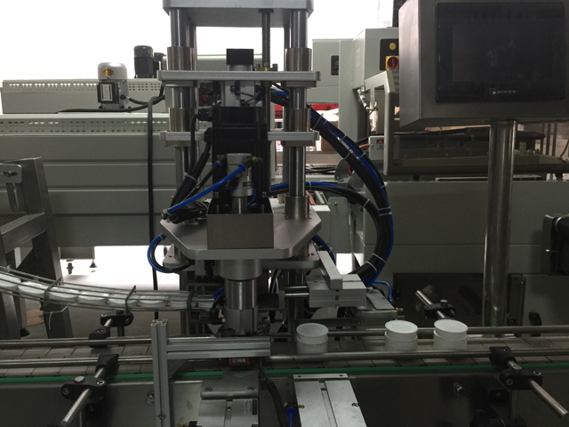 دستگاه آب بندی کوزه.jpg