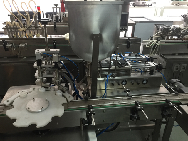 دستگاه پرکن دو شیشه.jpg