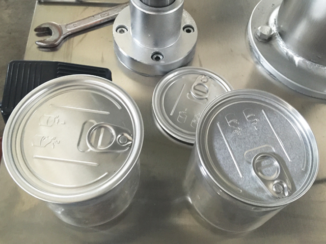 دستگاه درب قوطی های فلزی.jpg