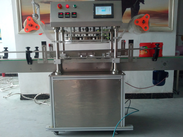 automatic three heads jars sealing equipment دستگاه آب بندی کوزه.jpg