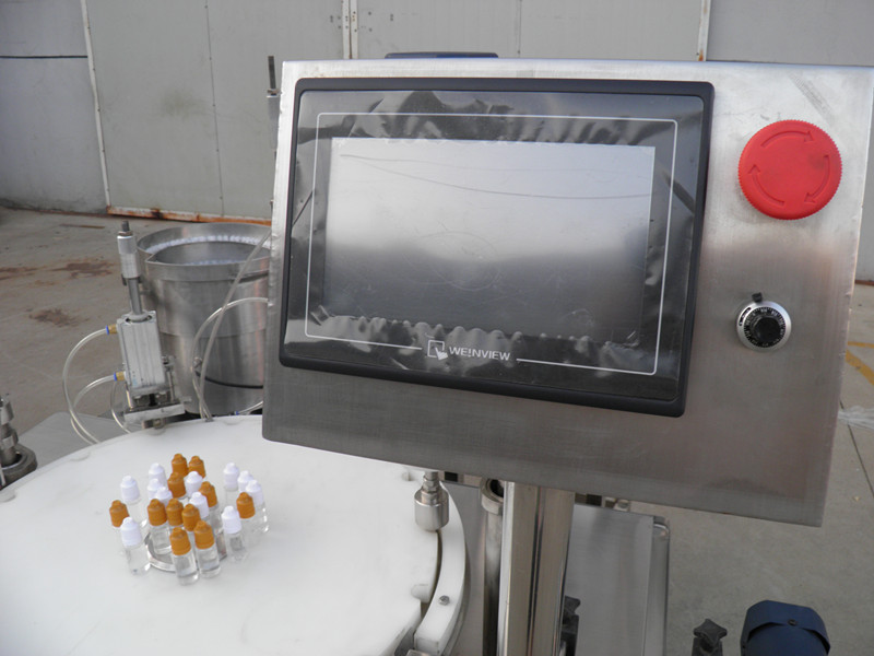 filling plugging capping labeling production line E مایع PLC درب پرکننده بطری labeling.jpg