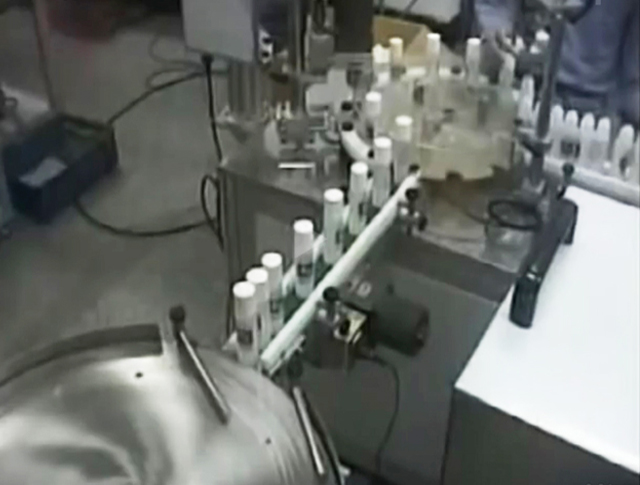 ماشین آلات درپوش پرکن.jpg