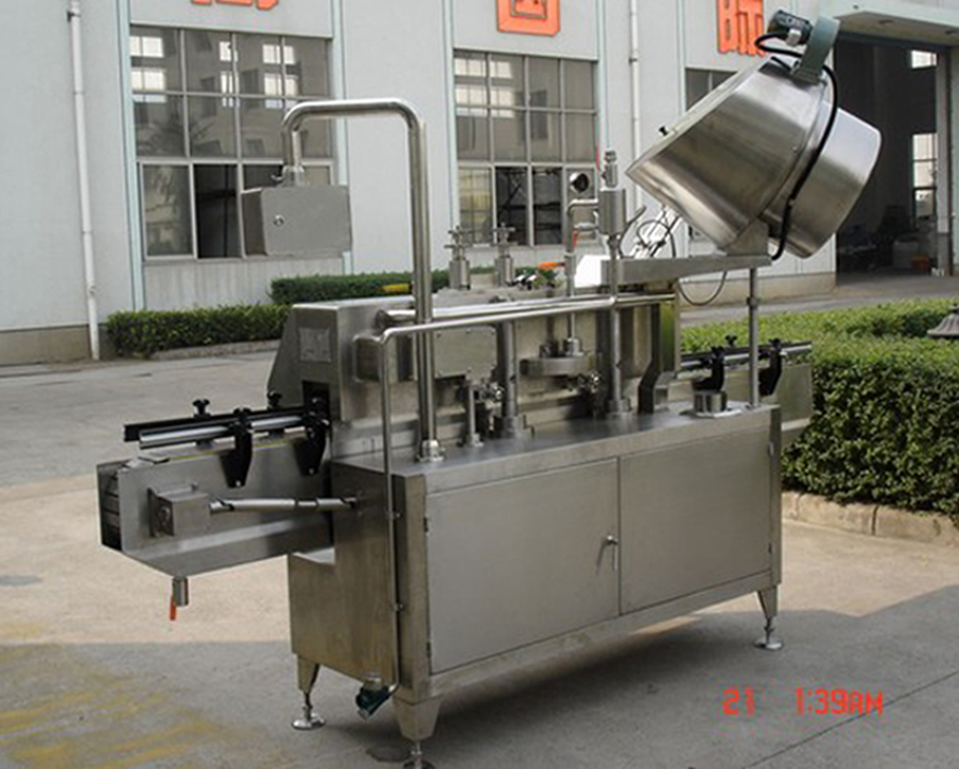 PLC-controlled system glass Jar twist off Steam Capper equipment vacuum capping machine for Glass Jars عکس پشتی کلاهک خلاء چرخشی.jpg
