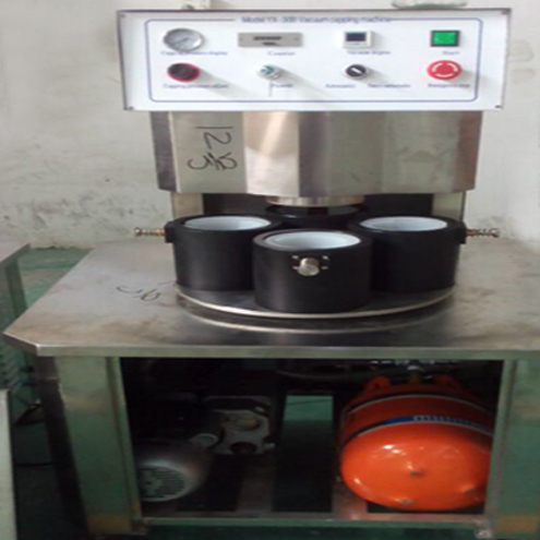 illustration of vacuum capping machine semi automatic تصویر برای درپوش خلاء.jpg