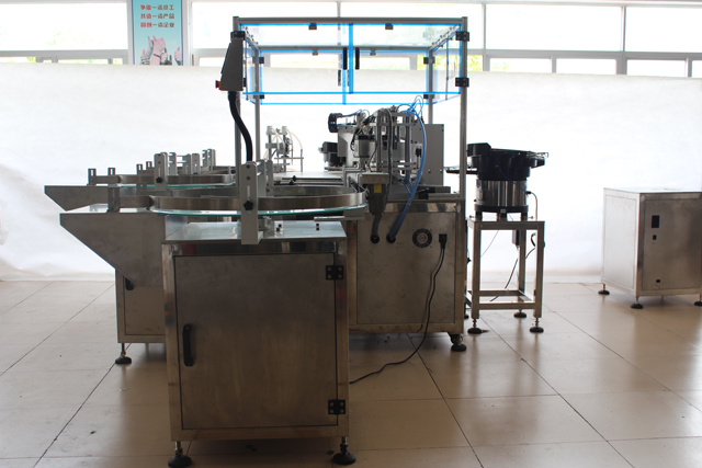 دستگاه اسانس درب پرکن.jpg