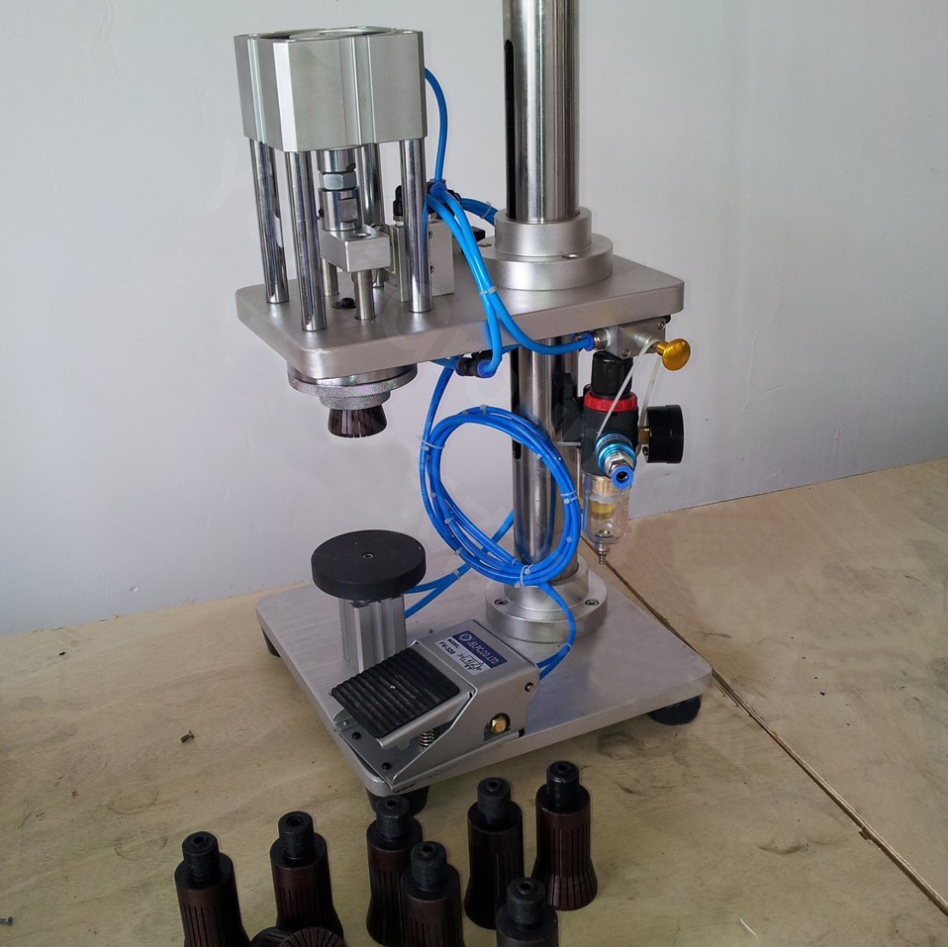 manual crimping machine for glass bottles تجهیزات درپوش پنوماتیک نیمه اتوماتیک pneumatic.jpg