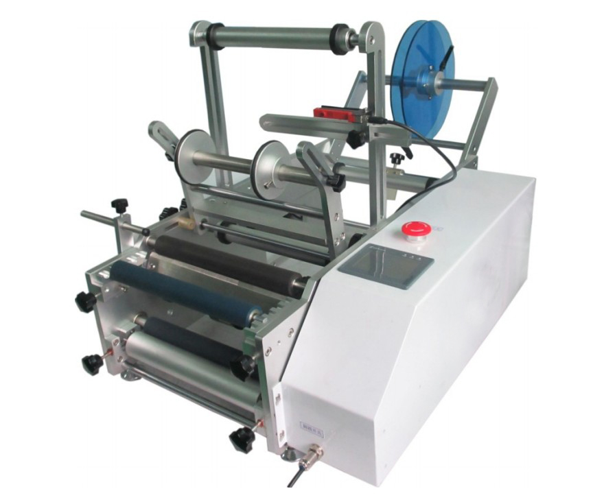 pharmaceutical equipment labeling machine for syringes دستگاه لیبل زن بطری های گرد.jpg