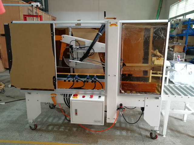 سیلر کارتن با دستگاه چسب حرارتی (1).jpg