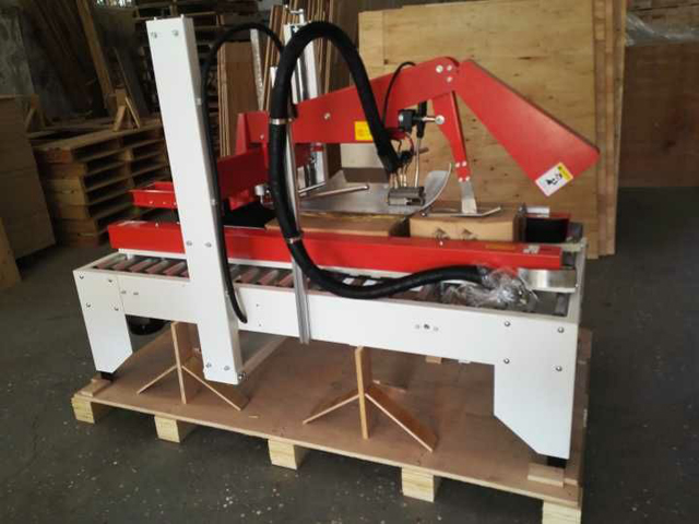 دستگاه آب بندی کارتن چسب حرارتی.jpg